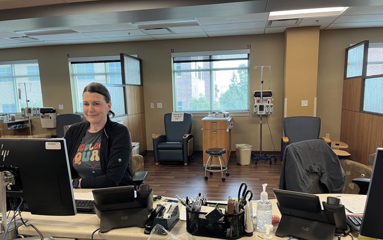 Good Samaritan Hospital radiation therapist Trista Brin maneuvering a linear accelerator. Courtesy Intermountain Health