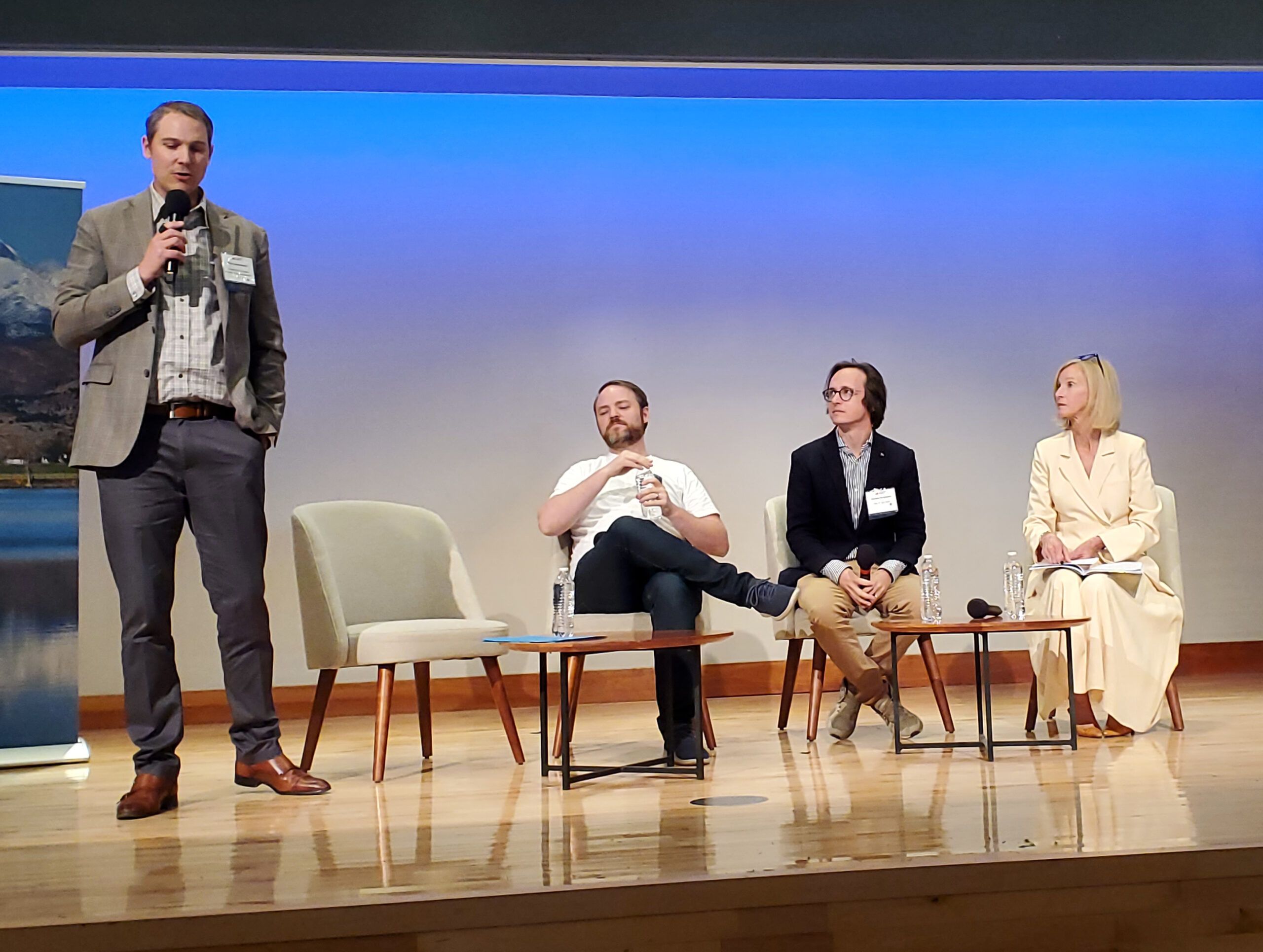 Speakers on a stage