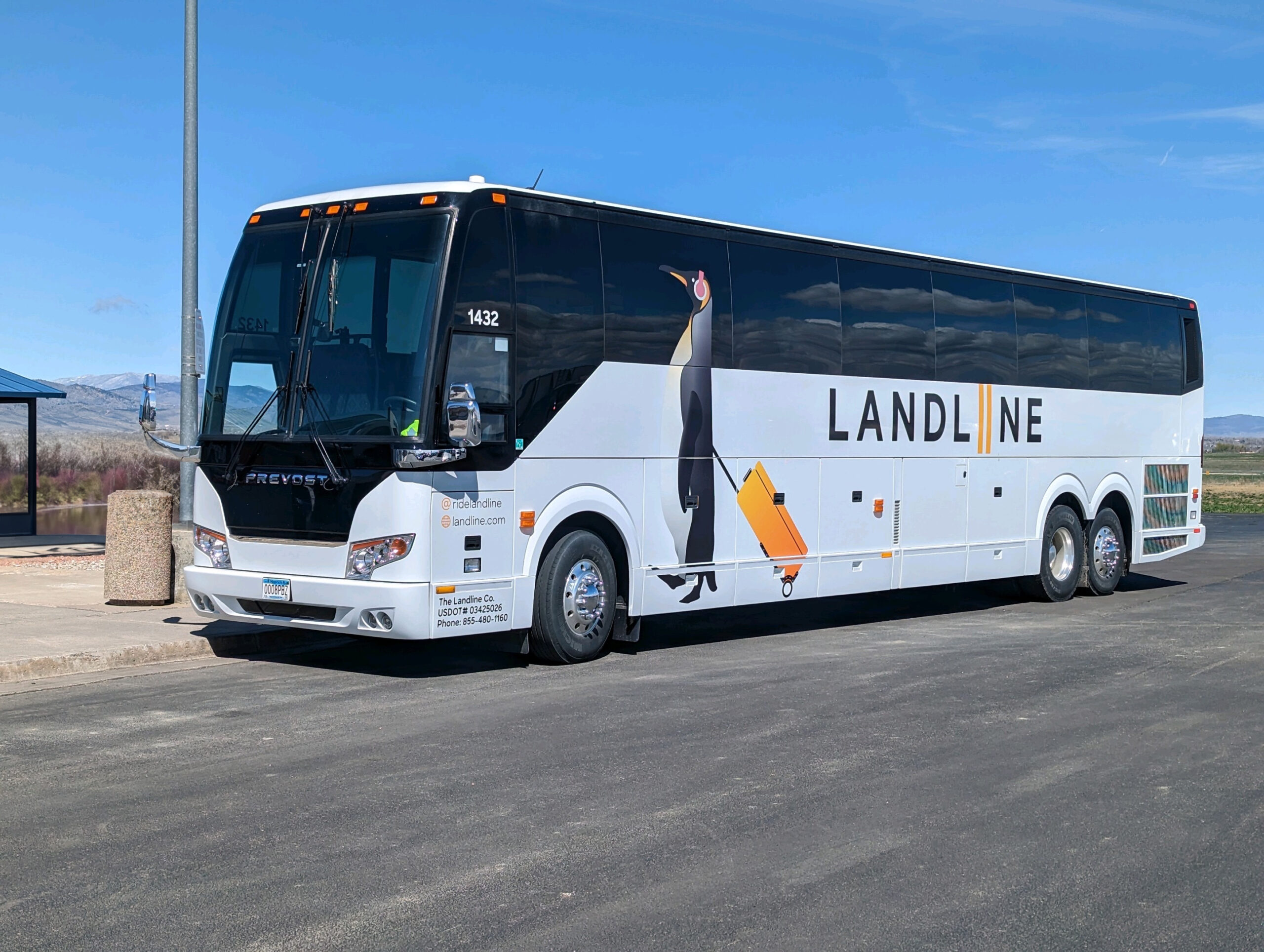 white Landline Co bus