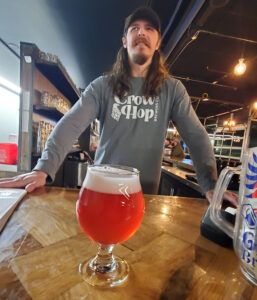 Bartender Mikey Sahm shows off an early version of the pink beer.