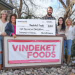 Mantooth presenting check to Vindeket Foods.