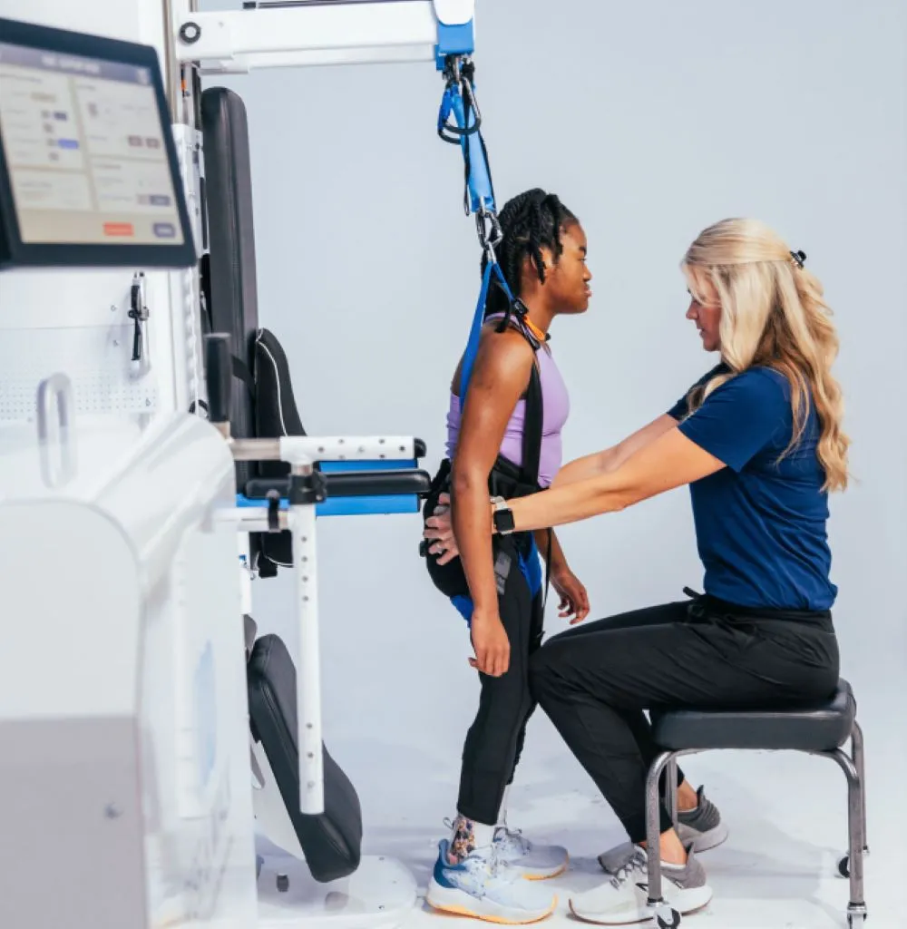 A patient is assisted by the robotic Rise&Walk.