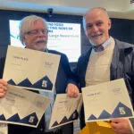 BizWest reporter Dallas Heltzell, left, and editor and publisher Christopher Wood display their award certificates Saturday at the Top of the Rockies Excellence in Journalism competition, sponsored by the Colorado chapter of the Society of Professional Journalists.