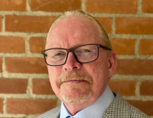 Paul Burkhardt has been hired as Naropa University’s new president.