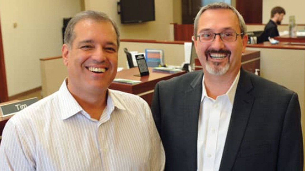 Carlos Pacheco and former Boulder Valley Schools Credit Union CEO Rick Allen