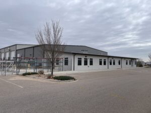 An affiliate of Transwest Trucks has purchased the former Power Equipment Co. building at 1836 First Ave. in Greeley.