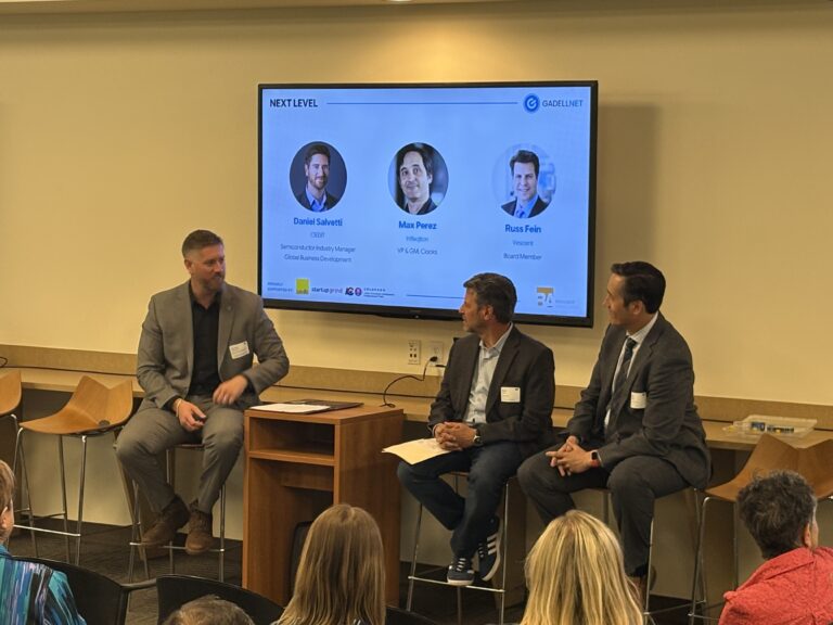 Infleqtion vice president Max Perez, Vescent Technologies Inc. board member Russ Fein and Colorado Office of Economic Development and International Trade enabling technologies subject matter expert Dan Salvetti participated in a fireside chat at Infleqtion’s Louisville office.