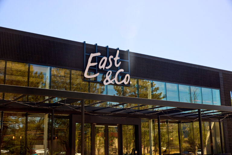 The exterior of the East & Co market hall in Boulder’s Flatiron Park.