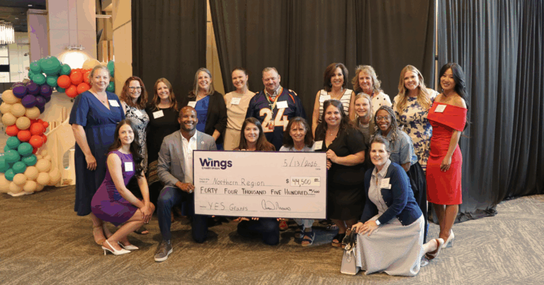 Ent Credit Union Northern grant recipients, with Champ Bailey.