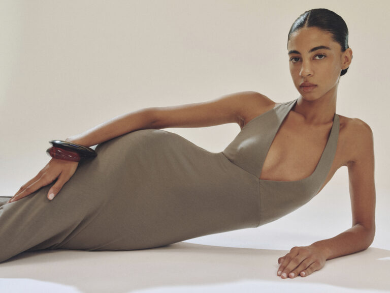 A model in a Reformation dress.