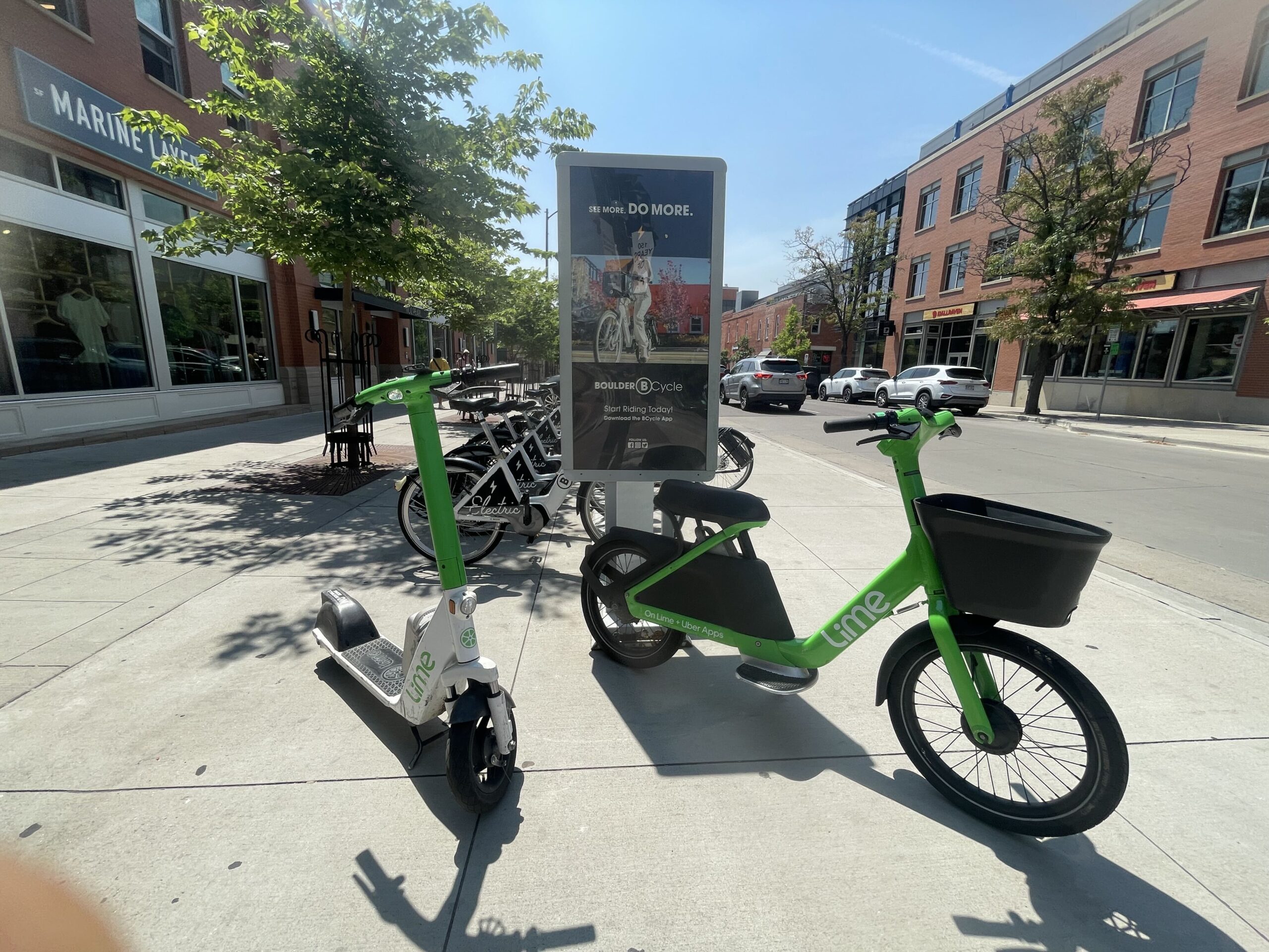 Lime e-scooters and e-bikes for rent on Pearl Street.
