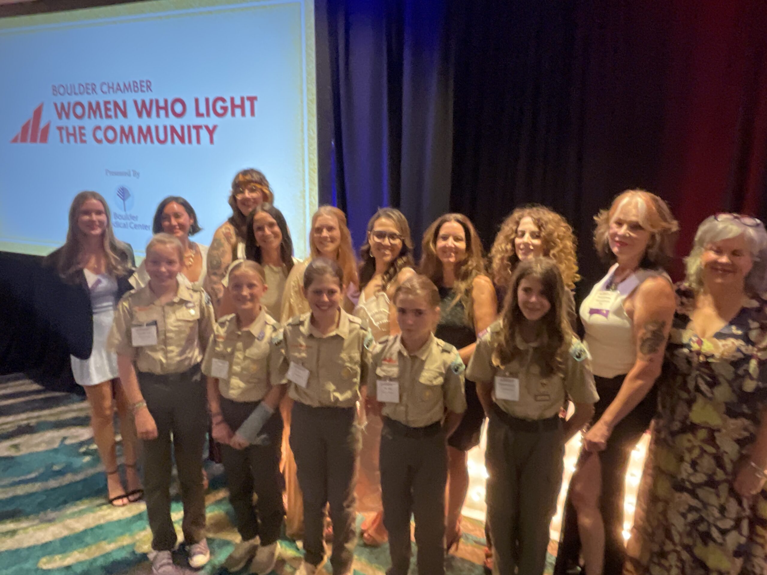 Honorees at the Boulder Chamber’s Women Who Light the Community awards celebration were joined by members of Scouting America, who helped present the awards.